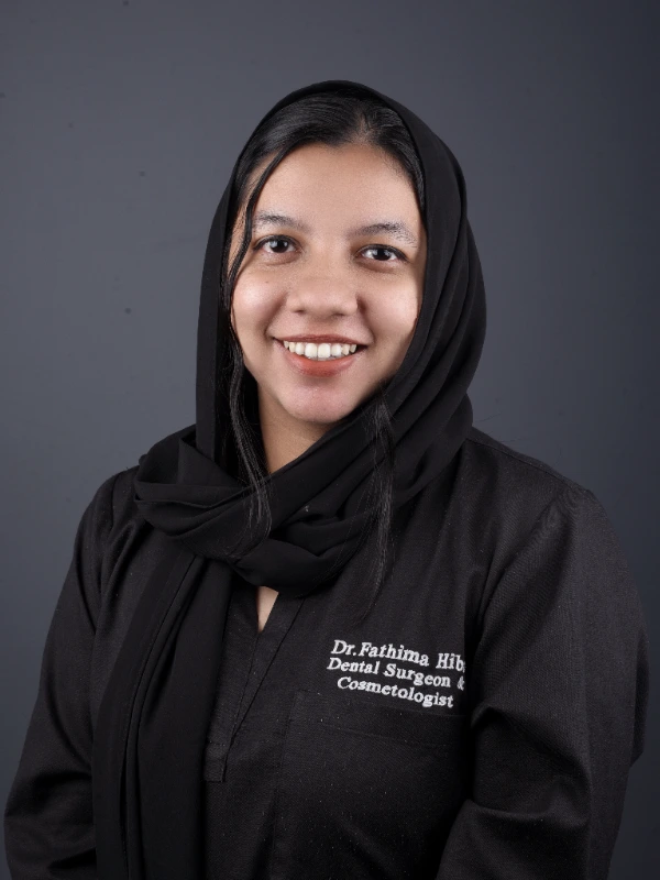 A professional portrait of Dr. Fathima Hiba, Chief Lady Dental Surgeon.