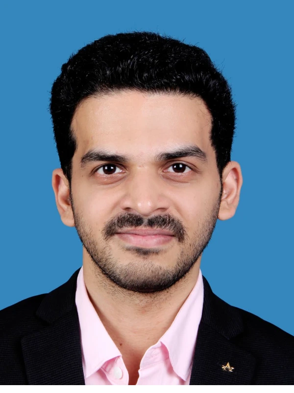 A professional portrait of Dr. Rohith G N, Periodontist.